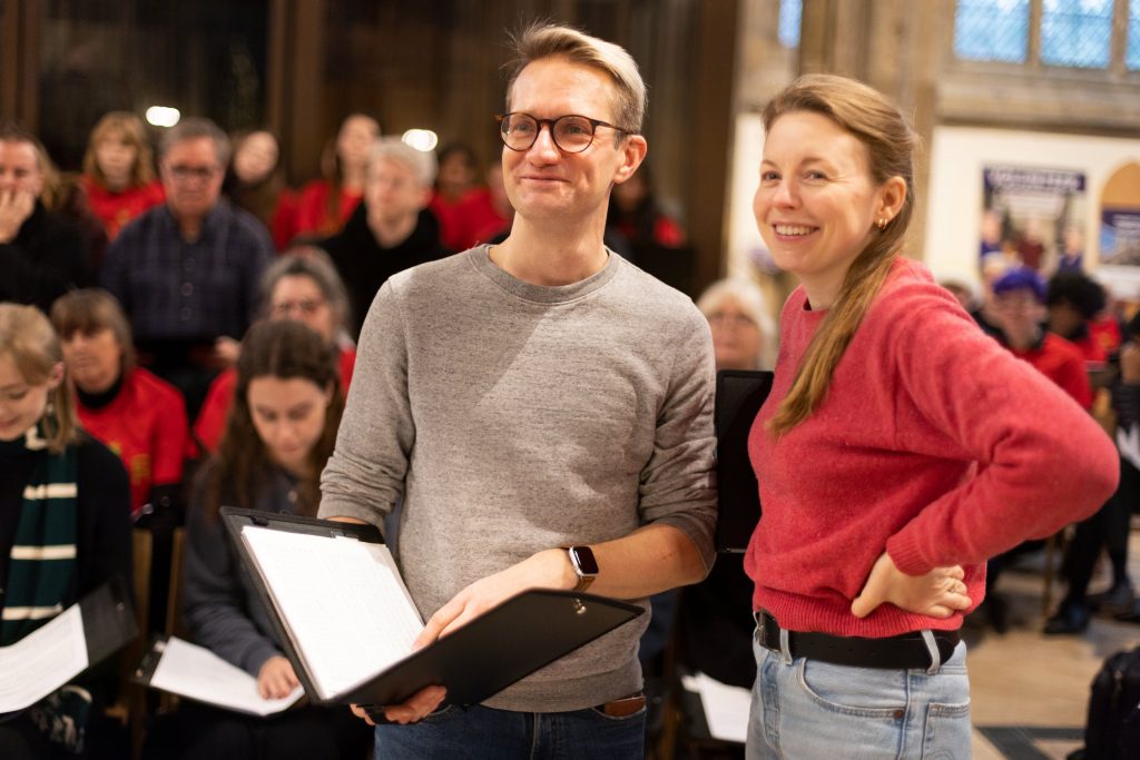 Music educators watching young people playing music