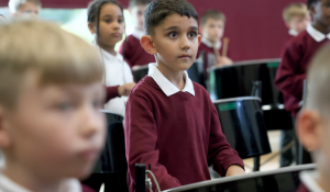 Boy in music lesson